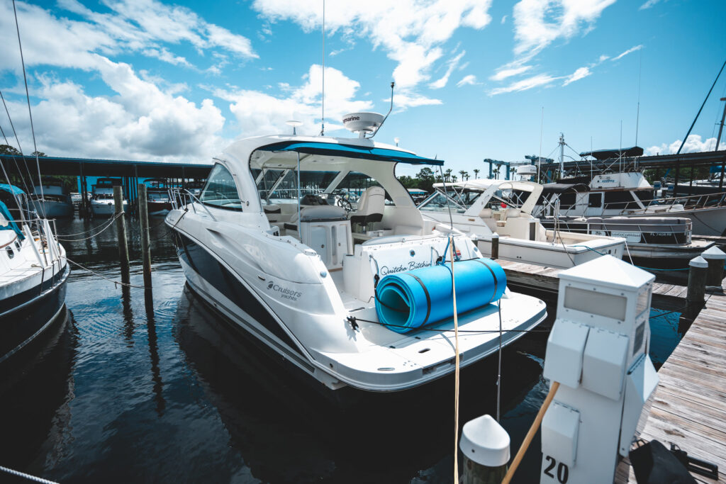 Infinity Getaway charter yacht at the dock in Shalimar