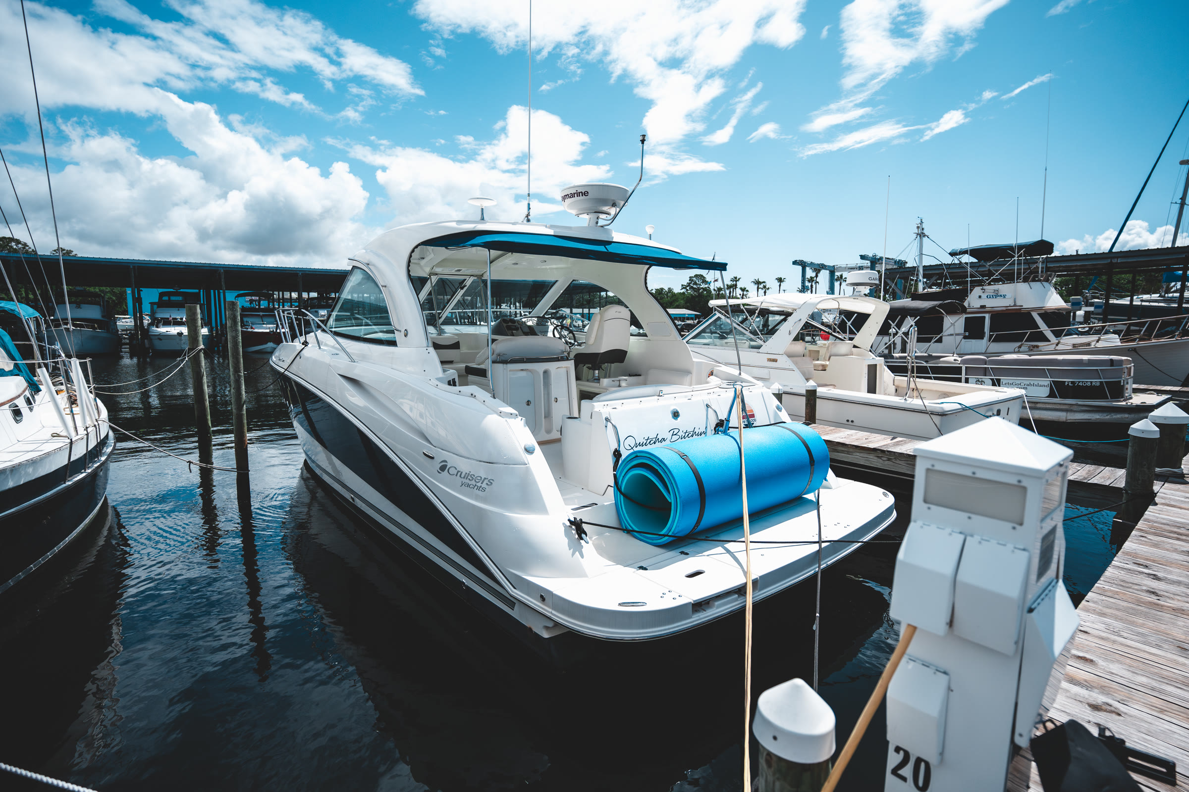Infinity Getaway charter yacht at the dock in Shalimar